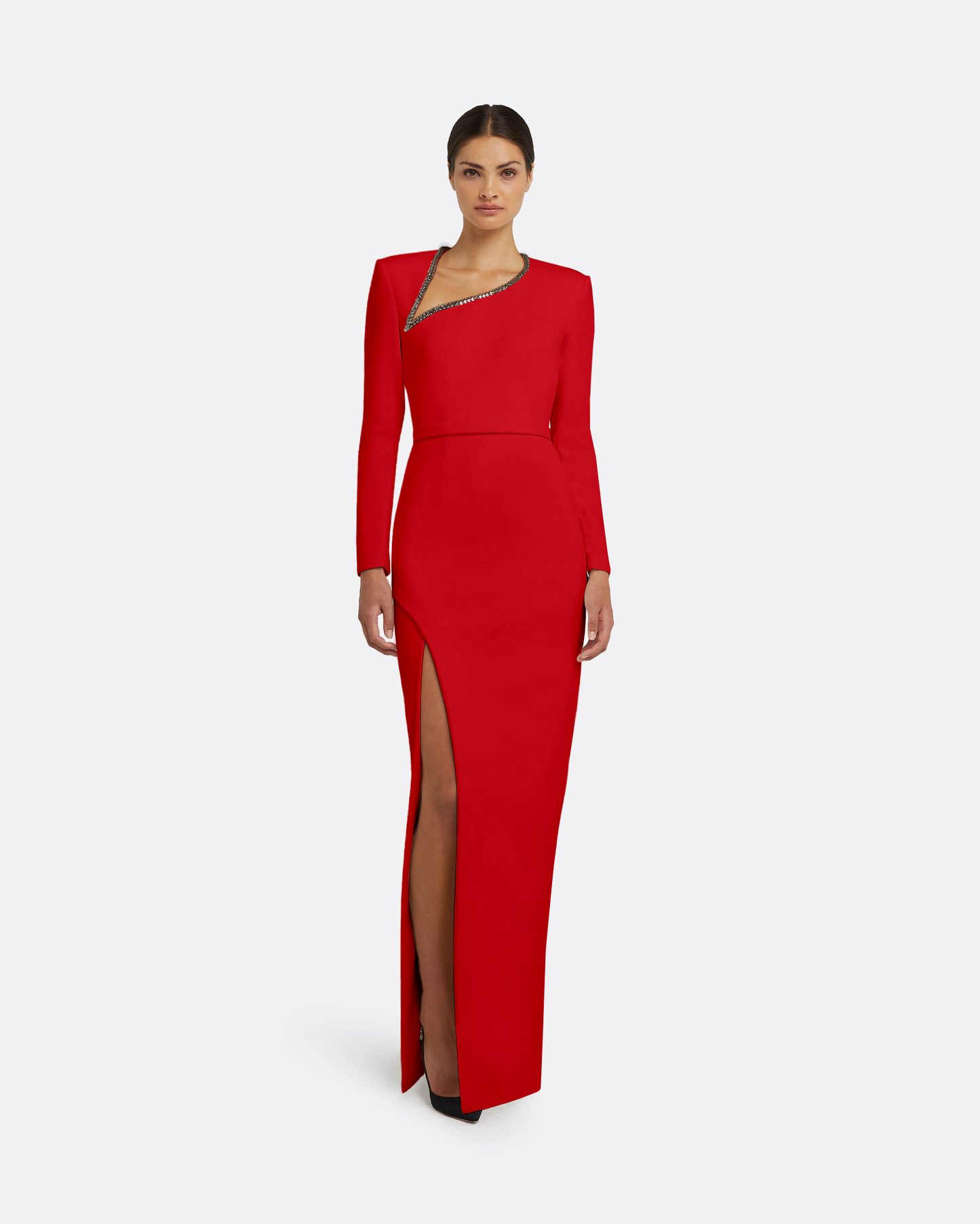 Red evening gown with a high slit on a white background