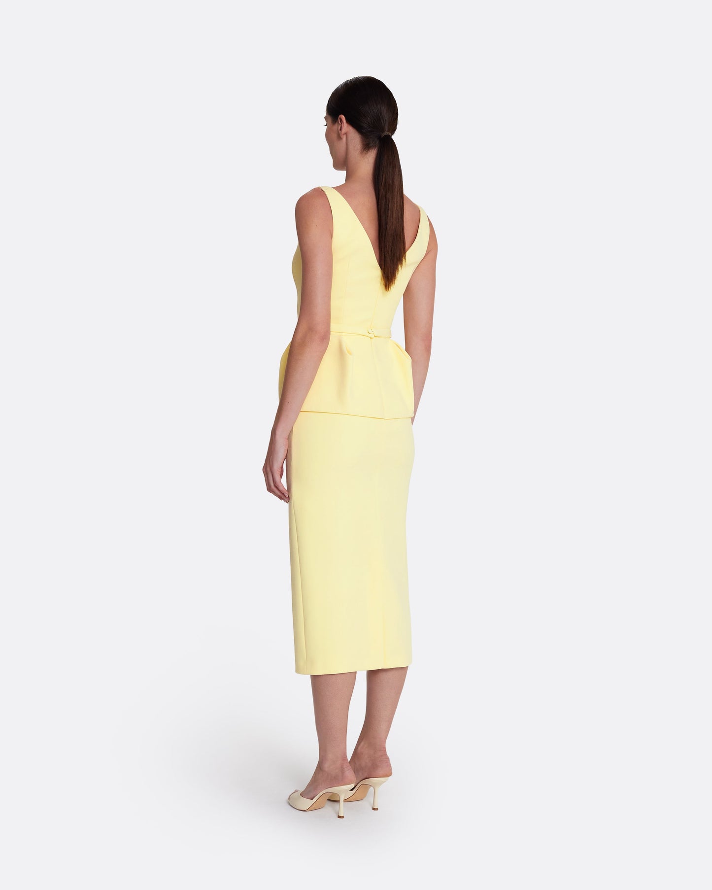 Sleeveless midi dress with flared peplum in PALE YELLOW