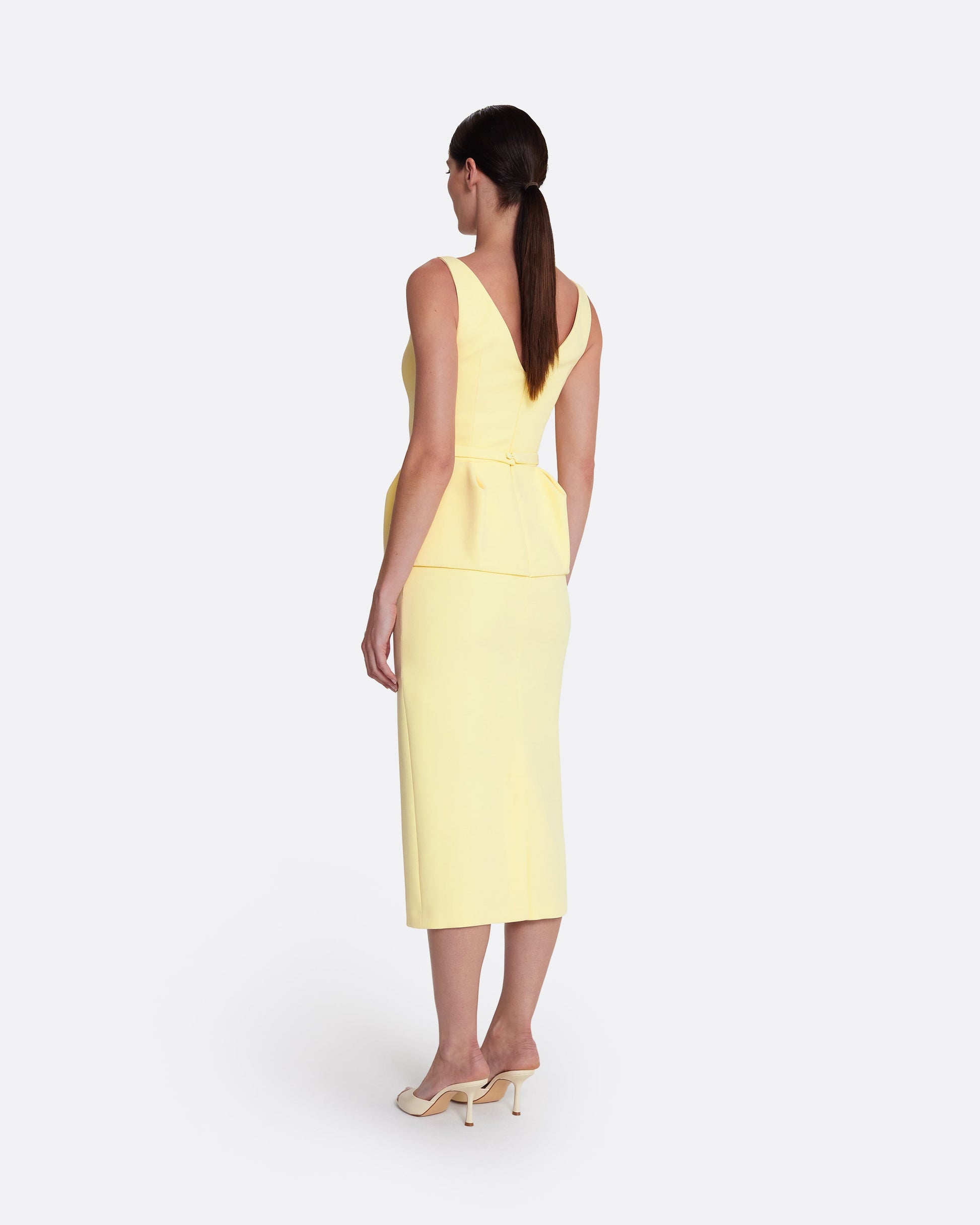 Sleeveless midi dress with flared peplum in PALE YELLOW