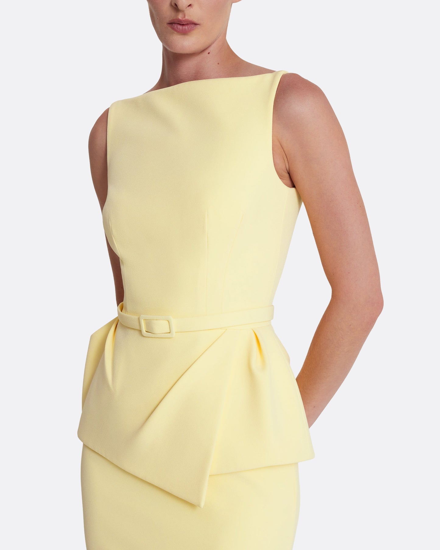 Sleeveless midi dress with flared peplum in PALE YELLOW